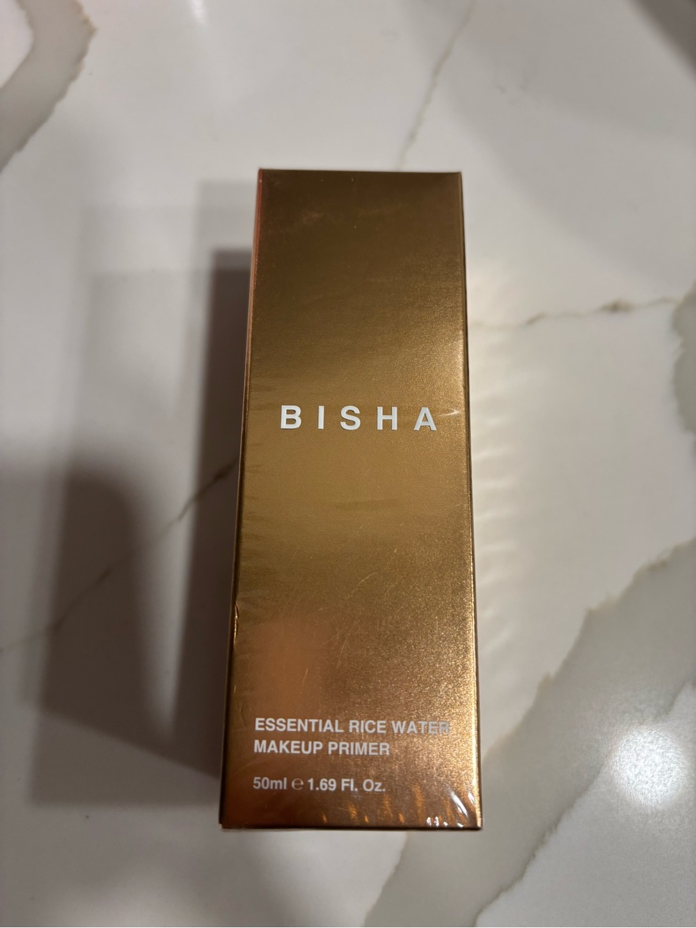 BISHA Essential Rice Water Makeup Primer and essential lip designer duo.